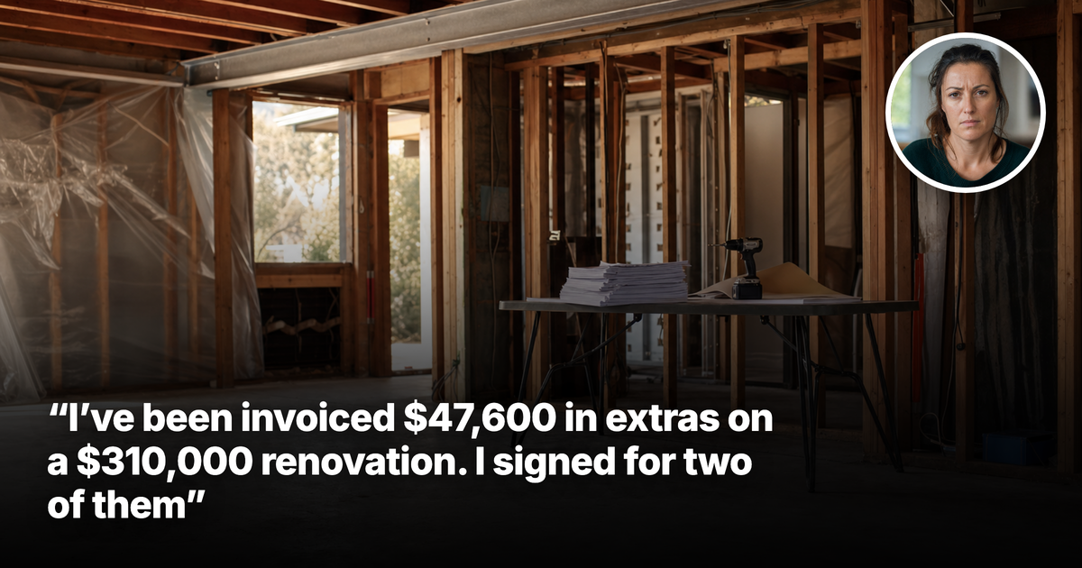 Unfinished renovation interior with exposed timber framing, a new steel support beam and a stack of blank paperwork on a trestle table