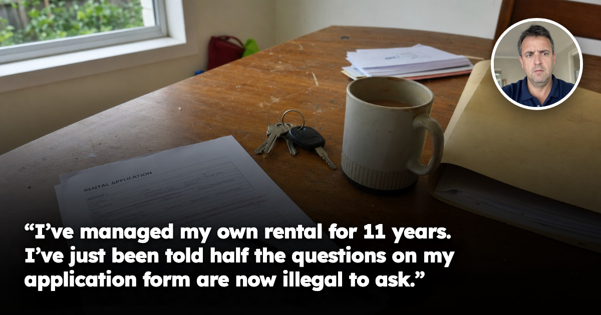 A worn kitchen table in an ordinary Australian home, with a printed rental application form marked in red pen, a set of house keys, a pen and a mug of cold tea. No people present.
